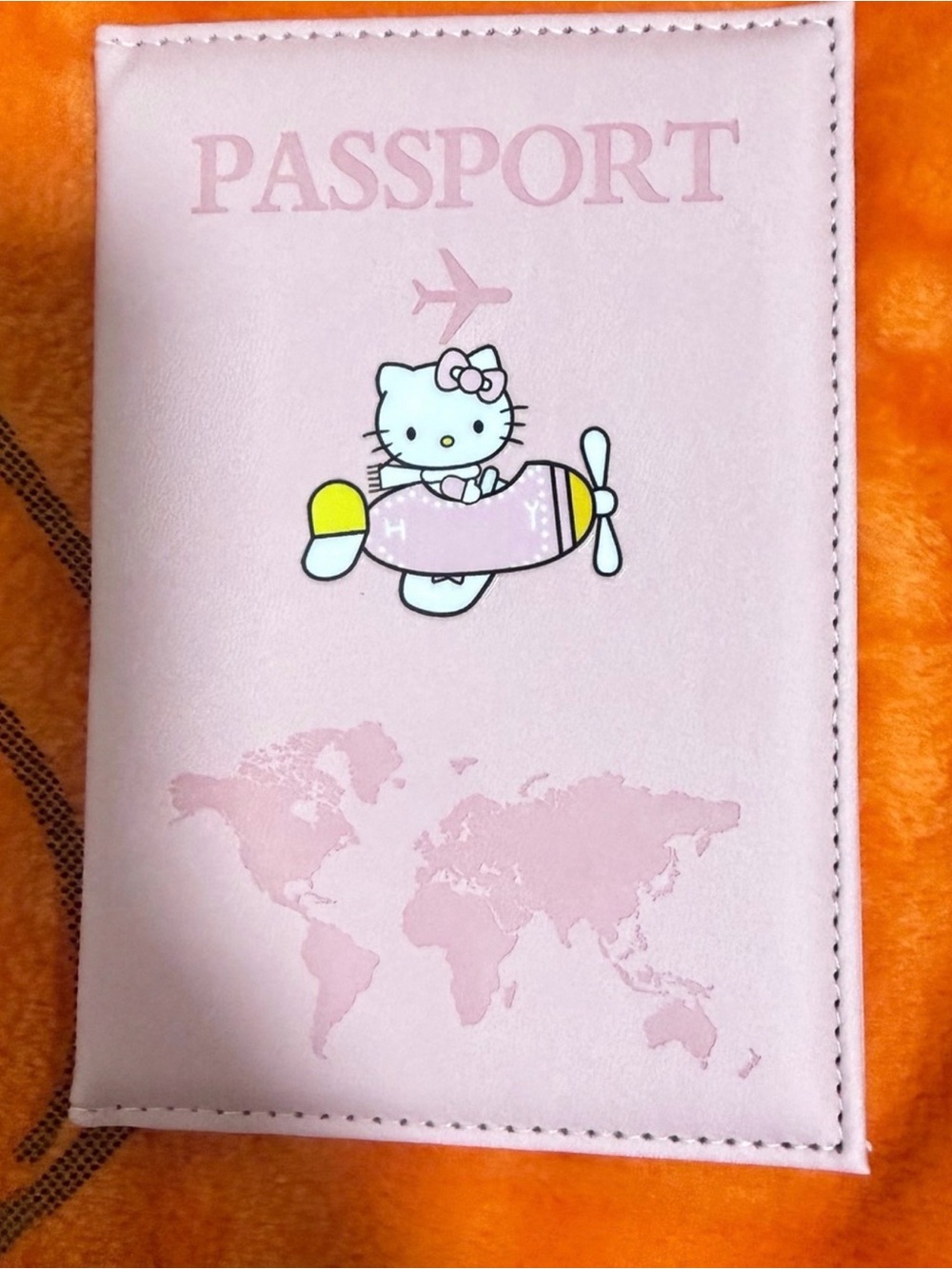 Hello Kitty Pink Passport Holder with Airplane Graphic